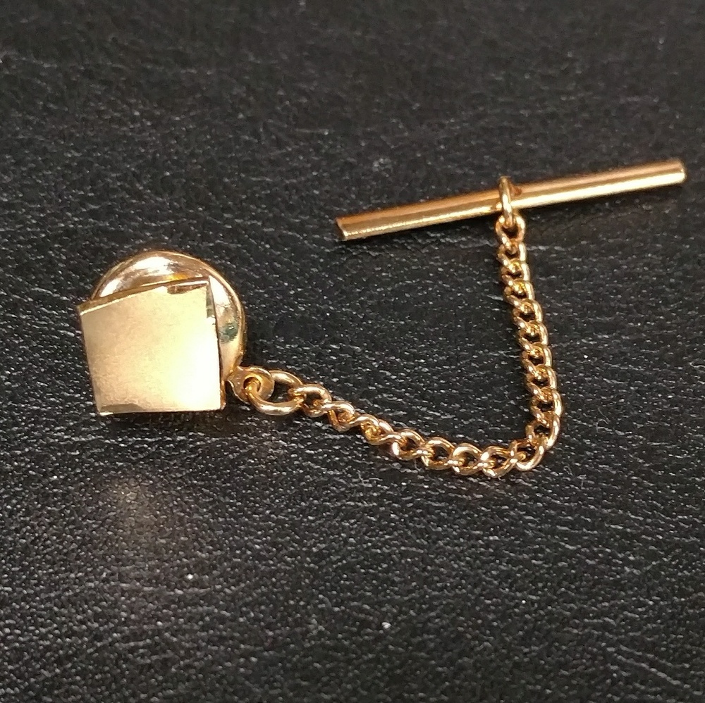 Vintage gold tone tie tack geometric